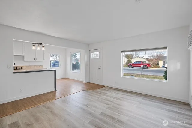 a view of an empty room and window