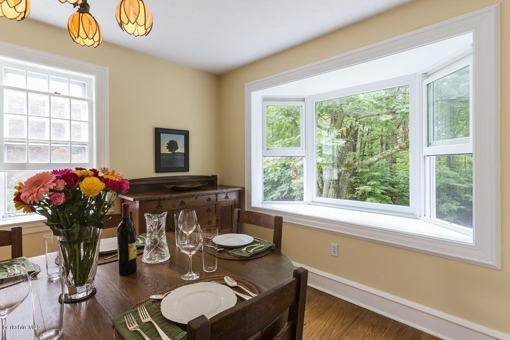 635 Reservoir Road Otis, MA 01029 - Photo 14 of 30 a dining room with furniture and window