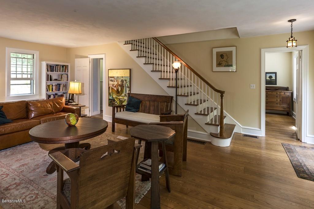 635 Reservoir Road Otis, MA 01029 - Photo 5 of 30 a living room with furniture and a table