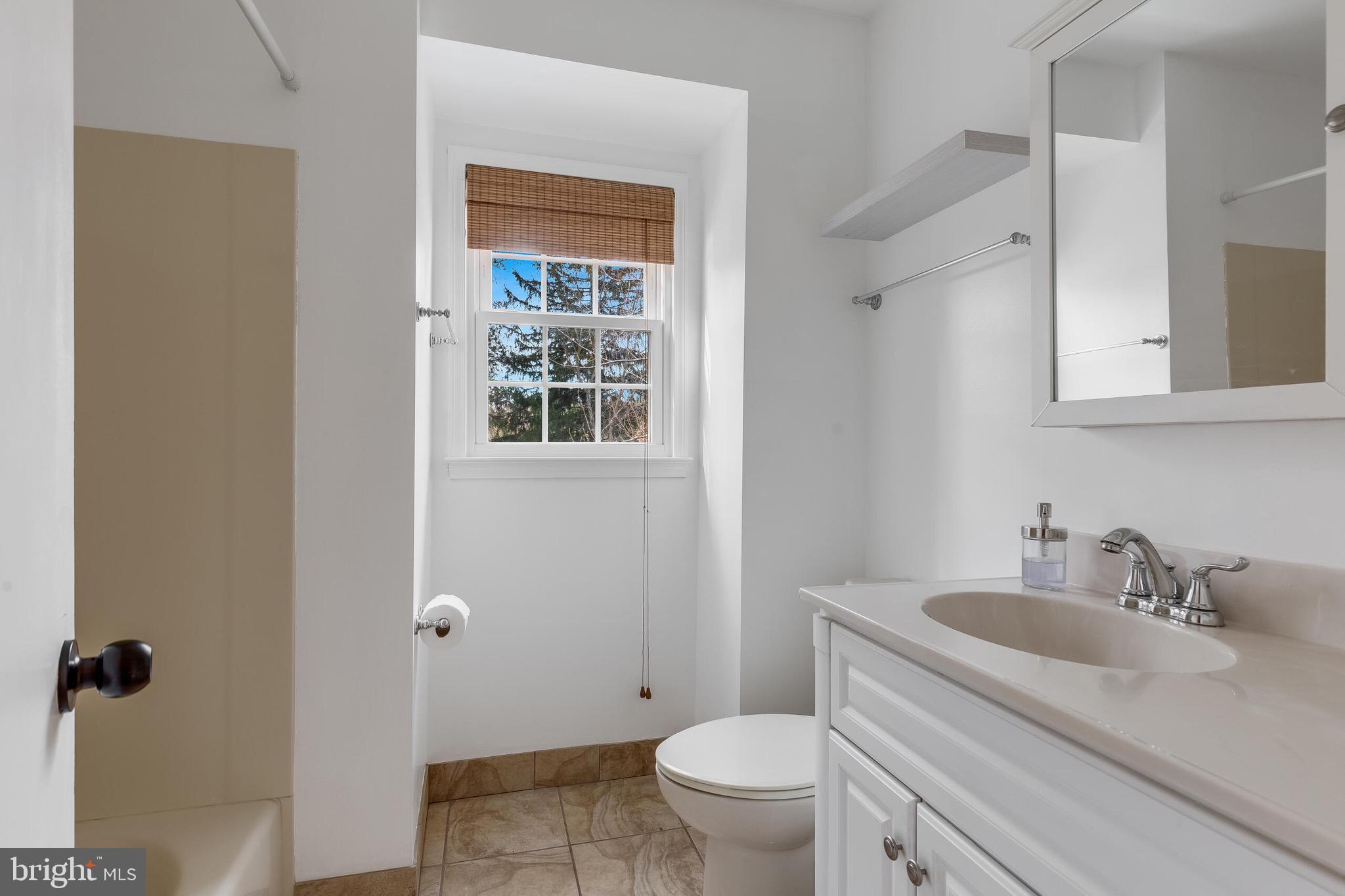 1700 Chester Mill Road Silver Spring, MD 20906 - Photo 21 of 53 a bathroom with a sink toilet and shower