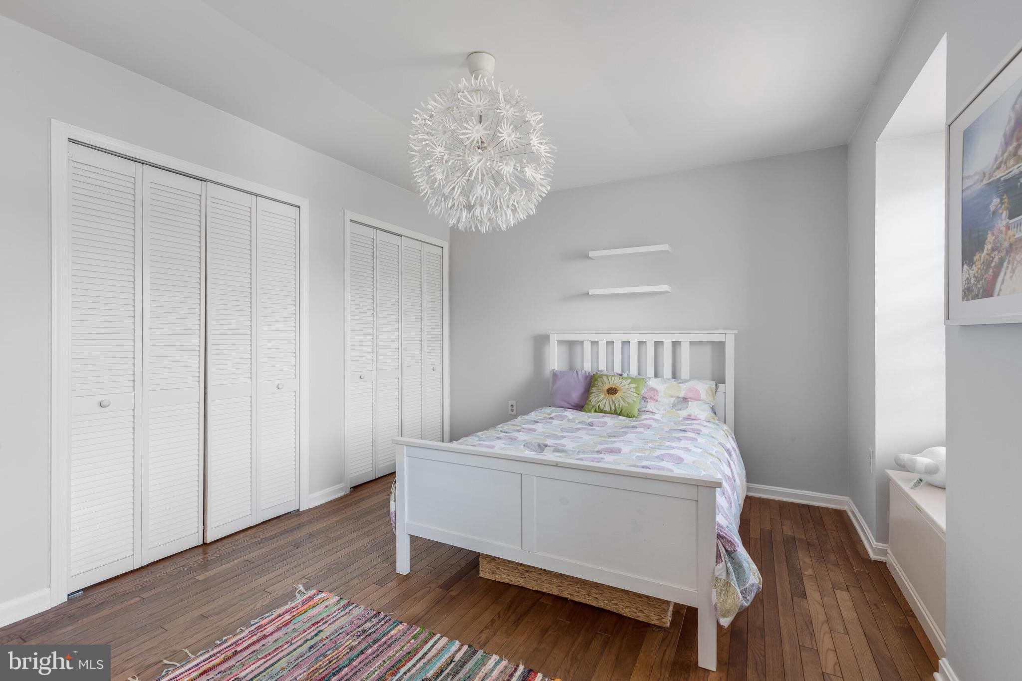 1700 Chester Mill Road Silver Spring, MD 20906 - Photo 24 of 53 a bedroom with a bed and a table