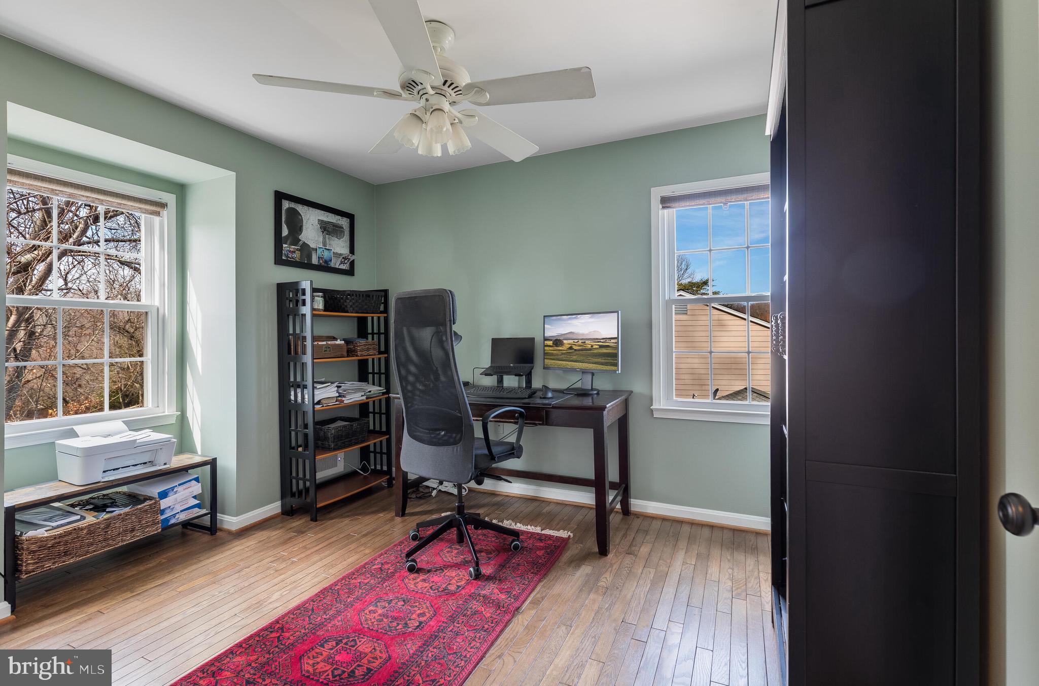 1700 Chester Mill Road Silver Spring, MD 20906 - Photo 26 of 53 a view of a workspace with furniture and a window