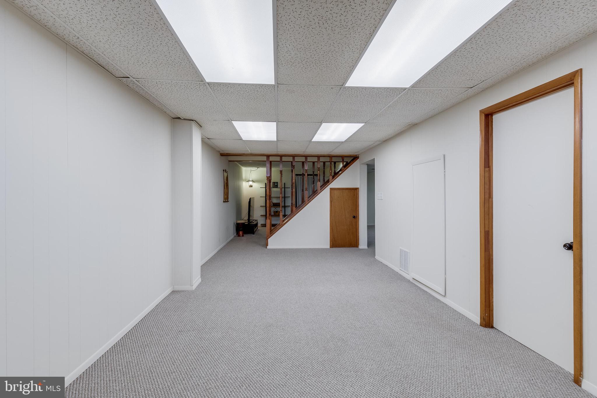 1700 Chester Mill Road Silver Spring, MD 20906 - Photo 28 of 53 a view of an empty room with stairs