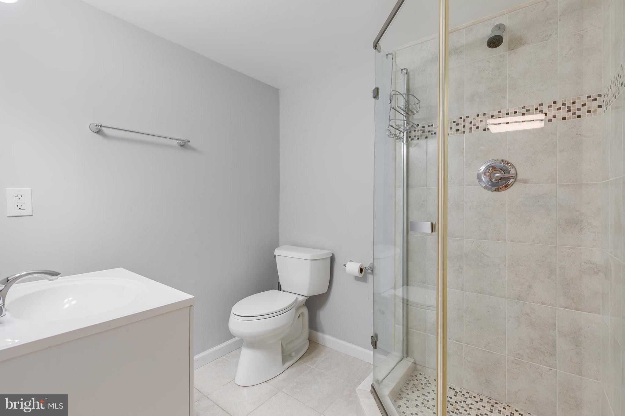 1700 Chester Mill Road Silver Spring, MD 20906 - Photo 31 of 53 a bathroom with a toilet and a shower