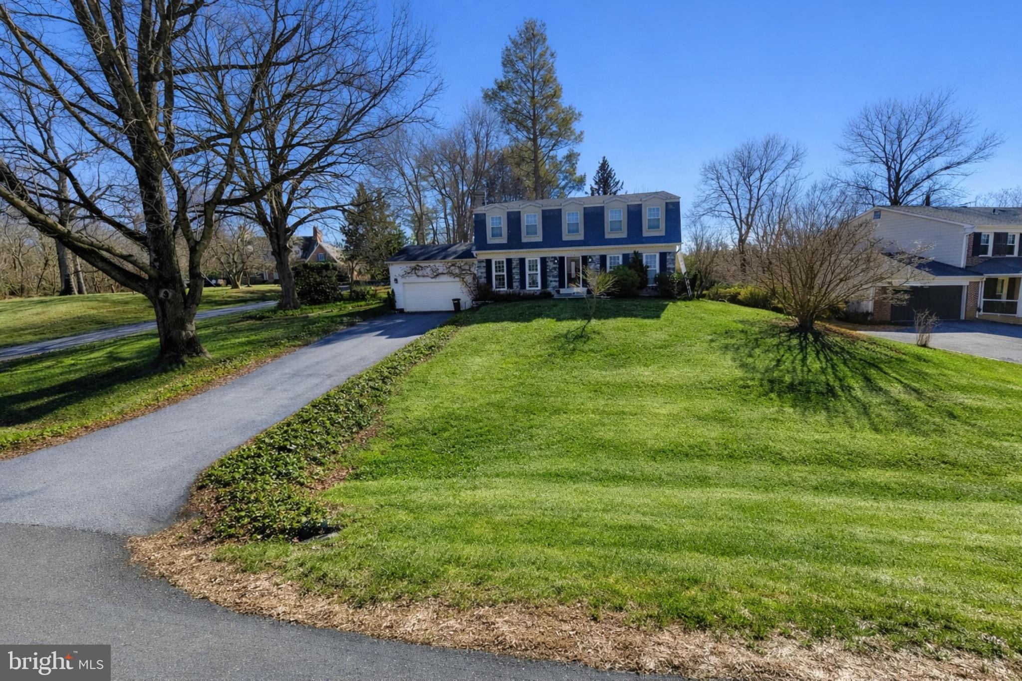 1700 Chester Mill Road Silver Spring, MD 20906 - Photo 41 of 53 a view of a house with a yard