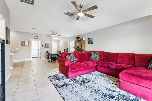 a living room with furniture and a couch