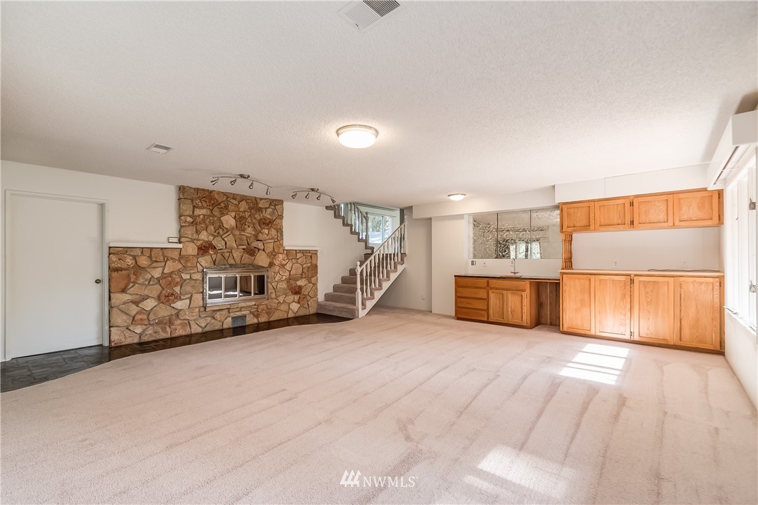 3367 Clearbrook Road Sumas, WA 98295 - Photo 19 of 25 a view of a room with cabinet ocean view and wooden floor