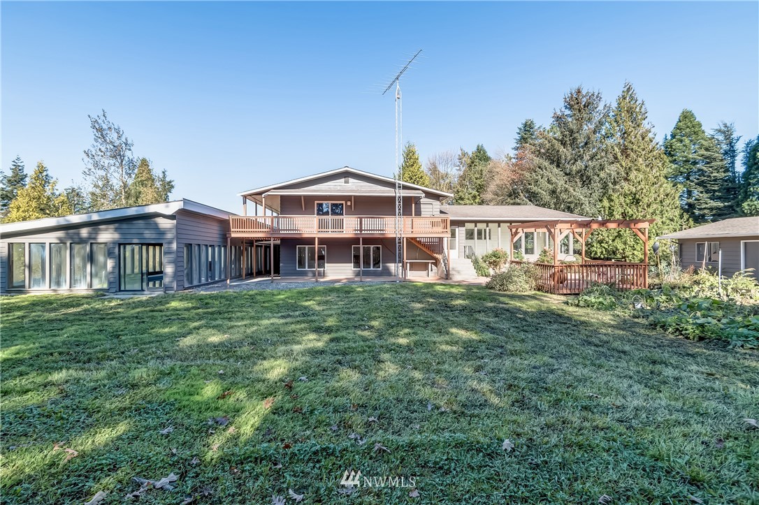 3367 Clearbrook Road Sumas, WA 98295 - Photo 7 of 25 a view of a house with a yard and sitting area
