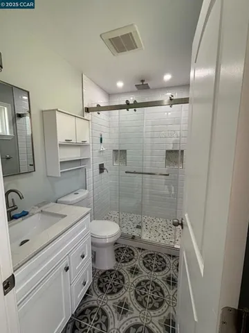 a view of a bench in a park