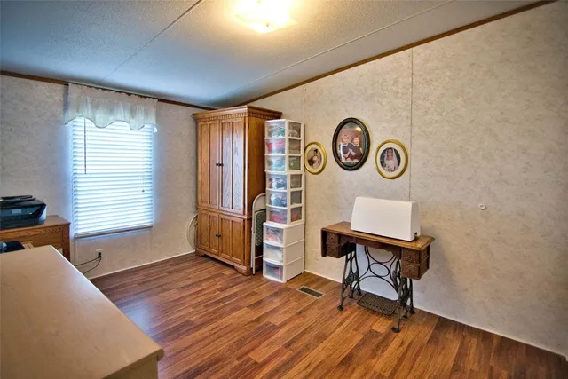 a kitchen with stainless steel appliances a refrigerator sink and cabinets