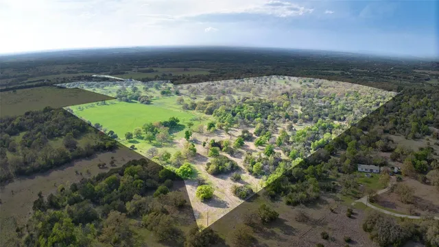 a view of a yard with an ocean