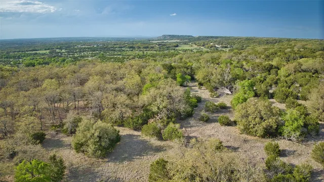 a view of a field with an outdoor space