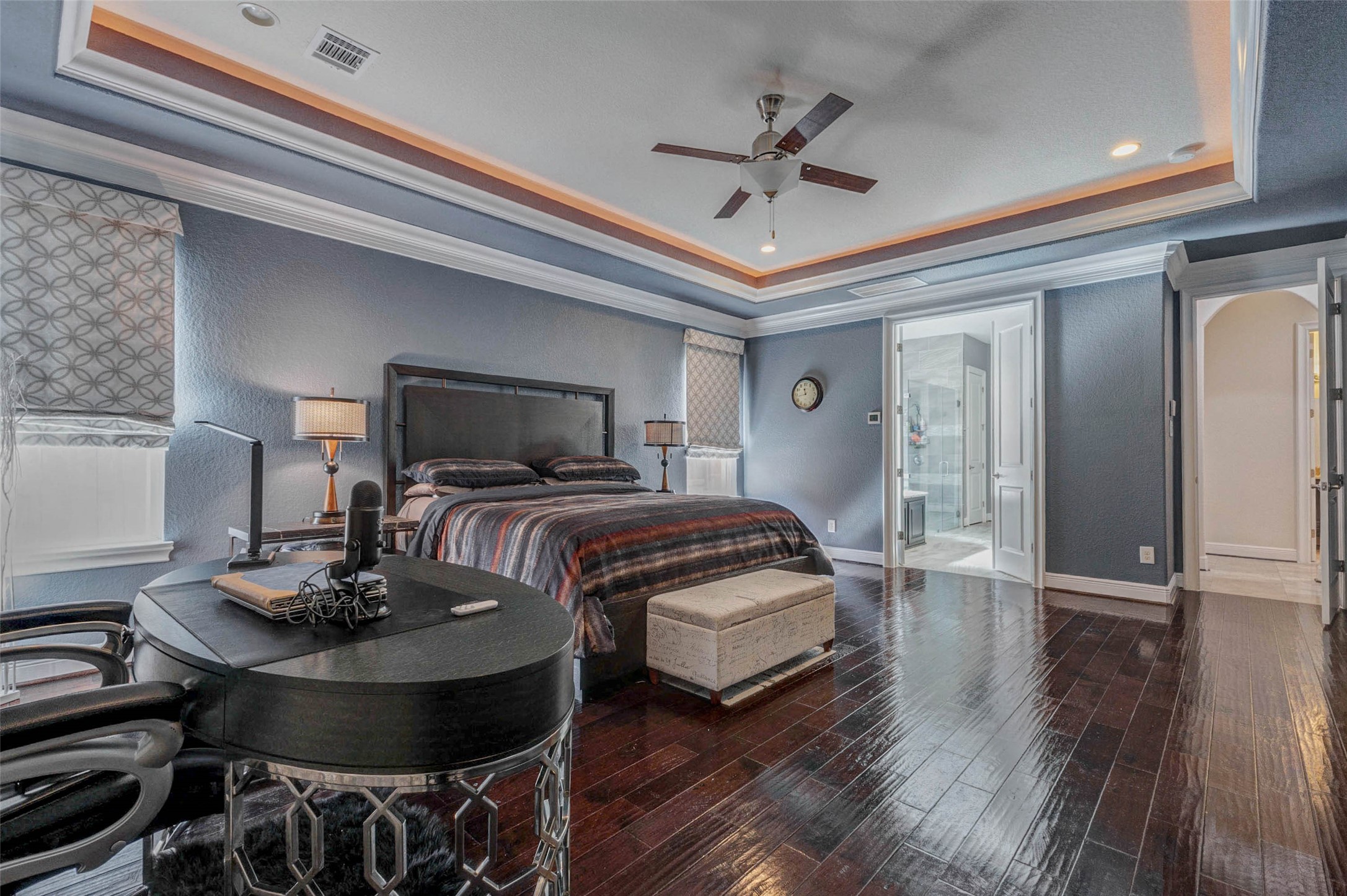 2310 Legends Way Katy, TX 77493 - Photo 19 of 50 a bedroom with bed and a chandelier