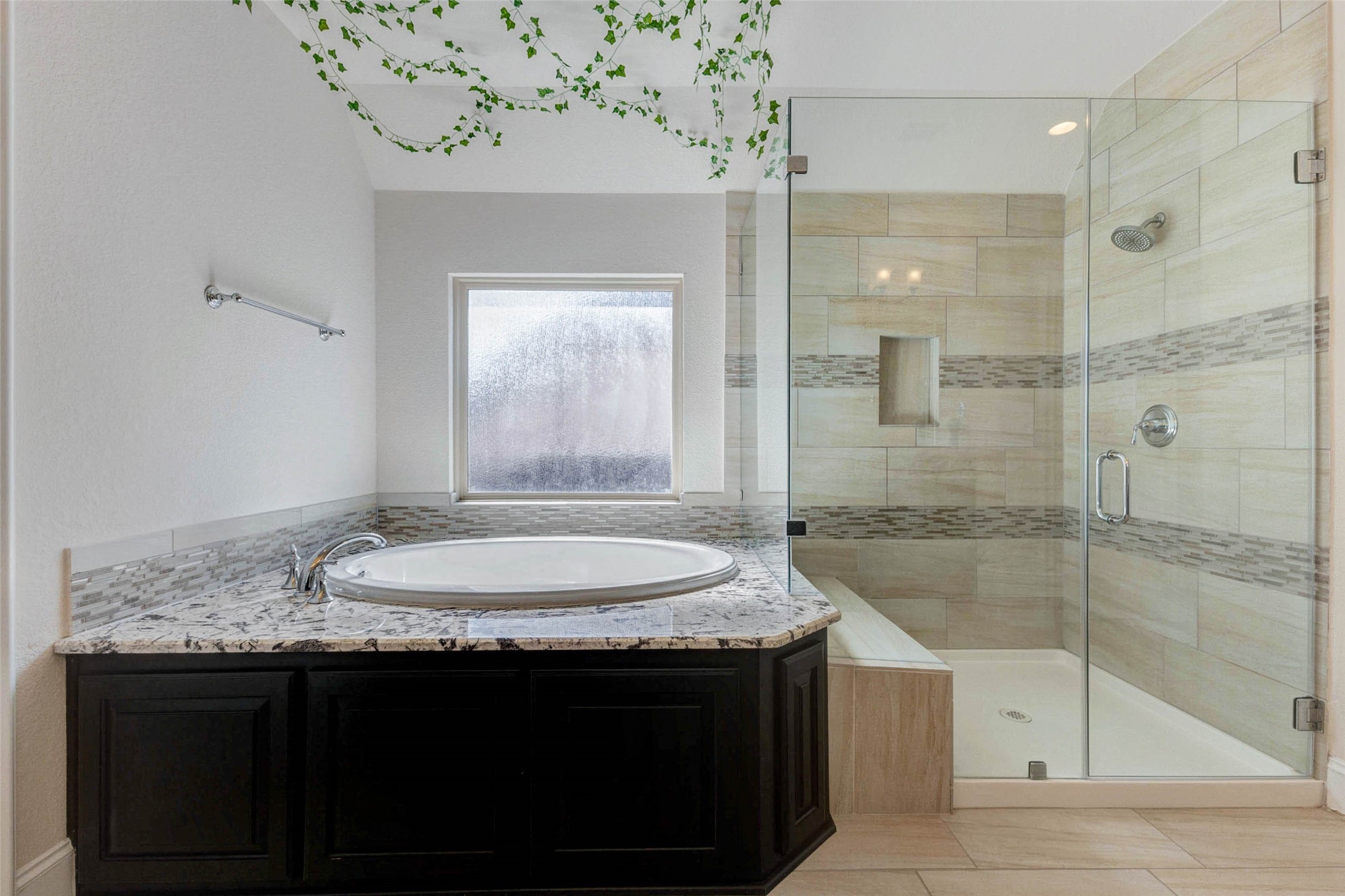 2310 Legends Way Katy, TX 77493 - Photo 26 of 50 a bathroom with a granite countertop sink a mirror and a shower
