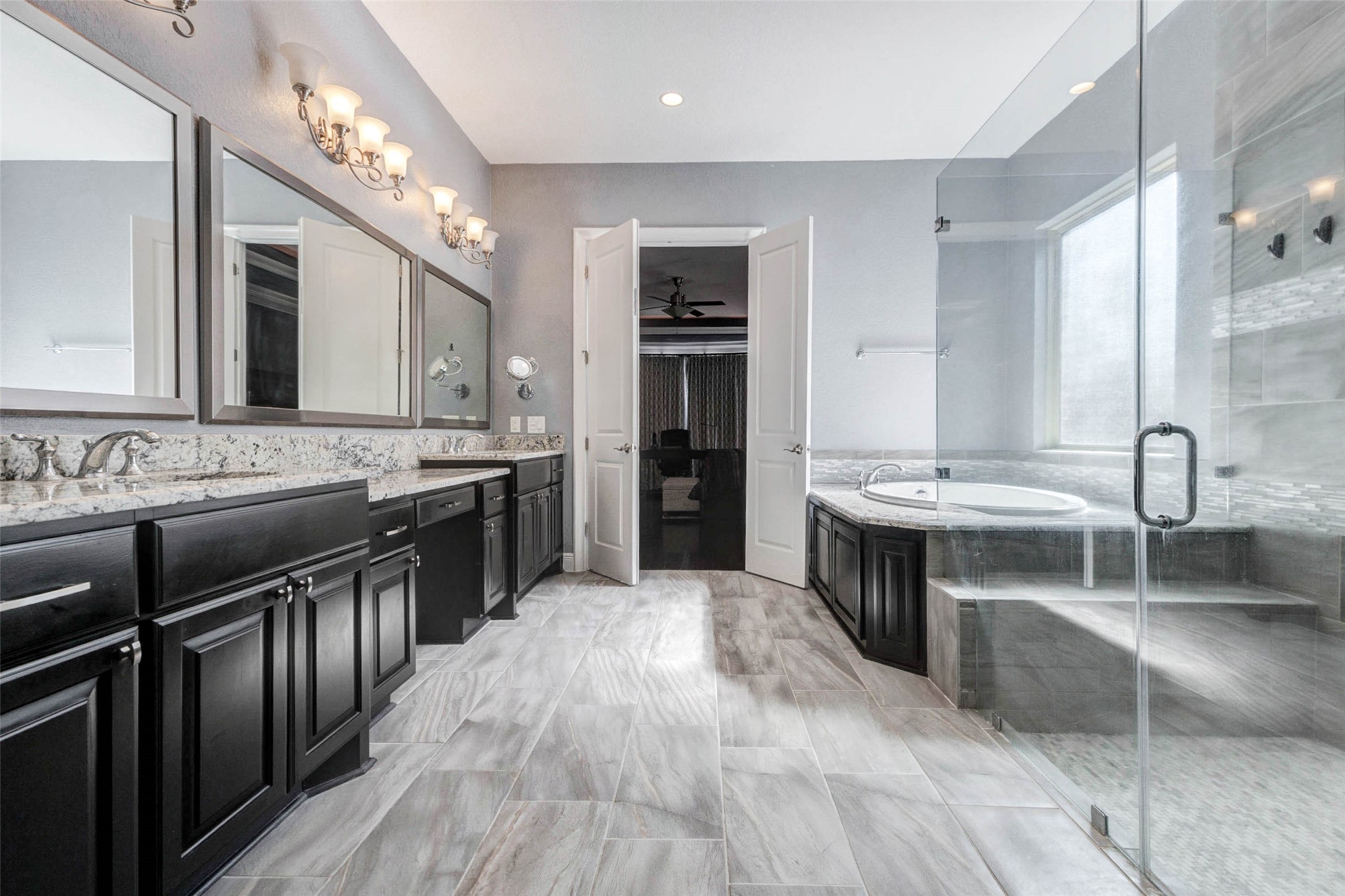 2310 Legends Way Katy, TX 77493 - Photo 31 of 50 a large kitchen with kitchen island a sink stainless steel appliances and cabinets