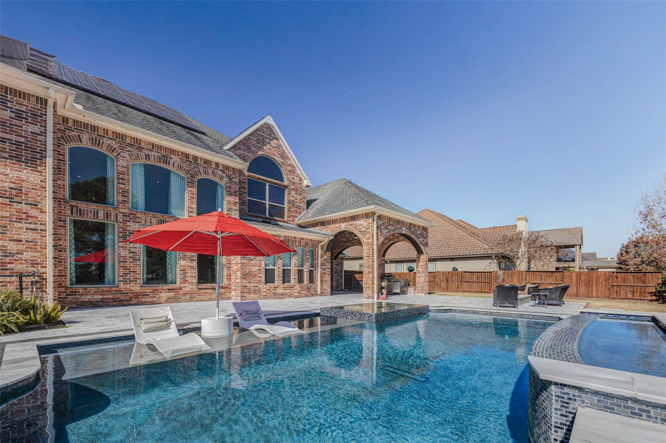 2310 Legends Way Katy, TX 77493 - Photo 36 of 50 a view of a house with pool and chairs