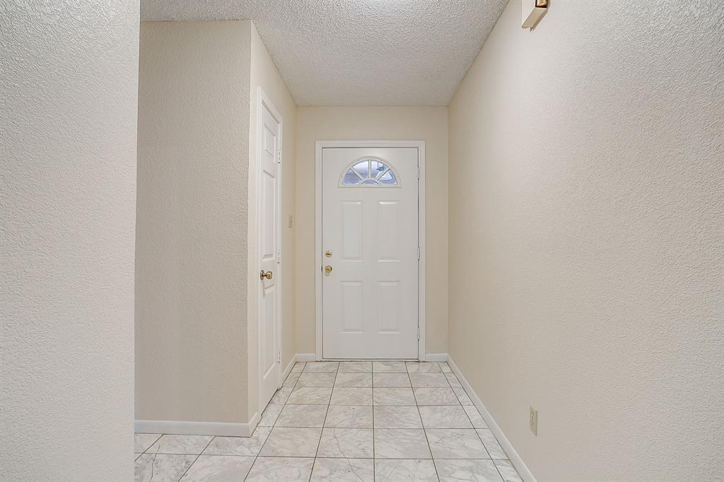 8613 Silver Creek Road White Settlement, TX 76108 - Photo 4 of 40 a view of an empty room