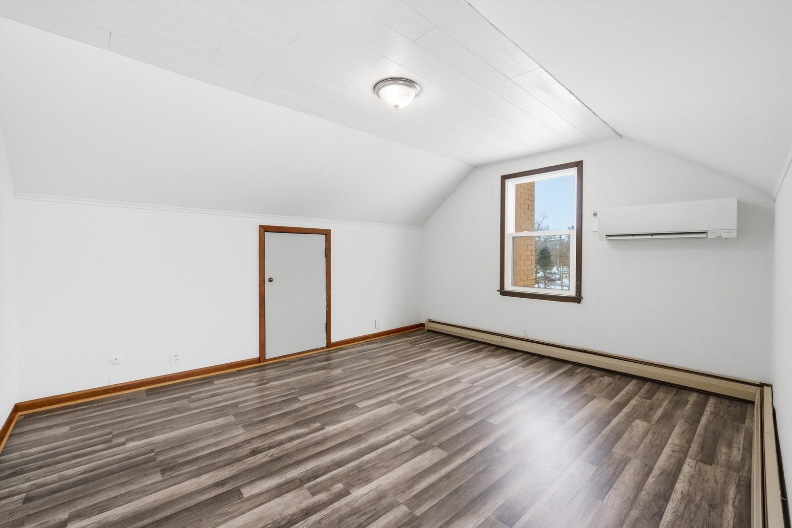 21122 Hillside Road Frankfort, IL 60423 - Photo 24 of 48 an empty room with wooden floor and windows