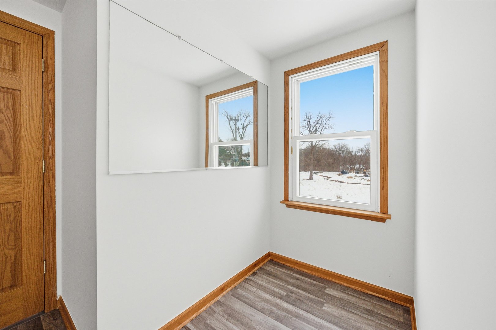 21122 Hillside Road Frankfort, IL 60423 - Photo 25 of 48 a view of a small space with wooden floor and a window
