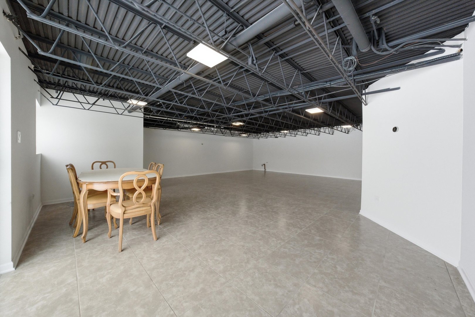 21122 Hillside Road Frankfort, IL 60423 - Photo 32 of 48 a view of a room with table and chairs