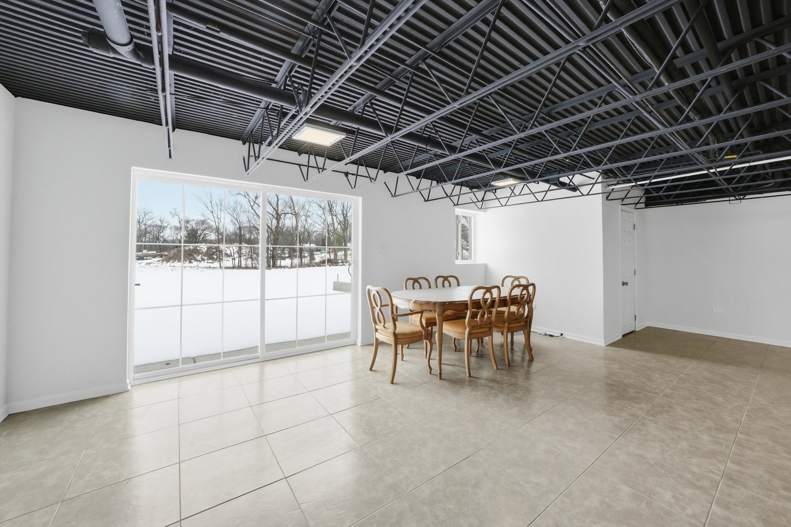 21122 Hillside Road Frankfort, IL 60423 - Photo 34 of 48 a view of a room with table chairs and a table