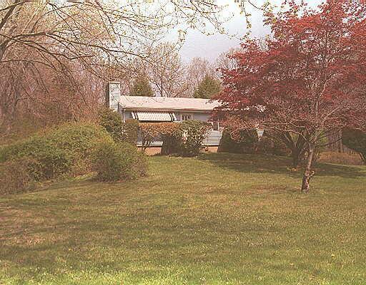 21 John Beach Road Newtown, CT 06470 - Photo 1 of 1 a view of outdoor space with garden