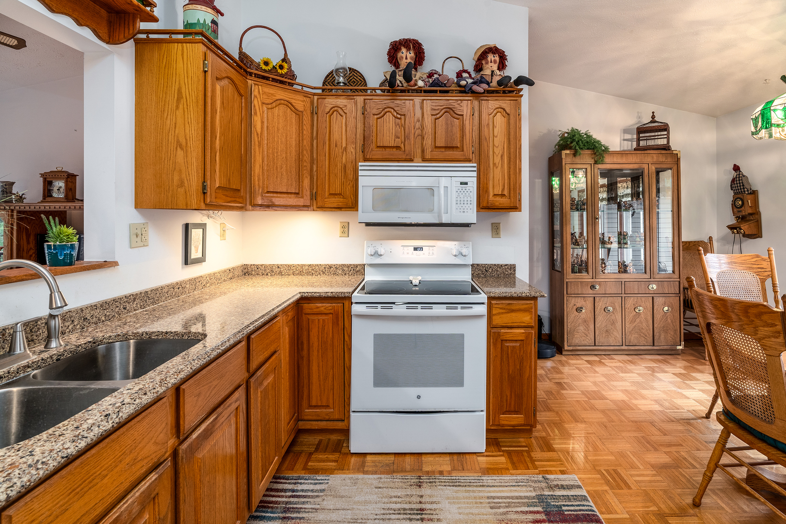 3085 Kaolin Road Cobden, IL 62920 - Photo 14 of 83 a kitchen with stainless steel appliances granite countertop a sink stove and cabinets