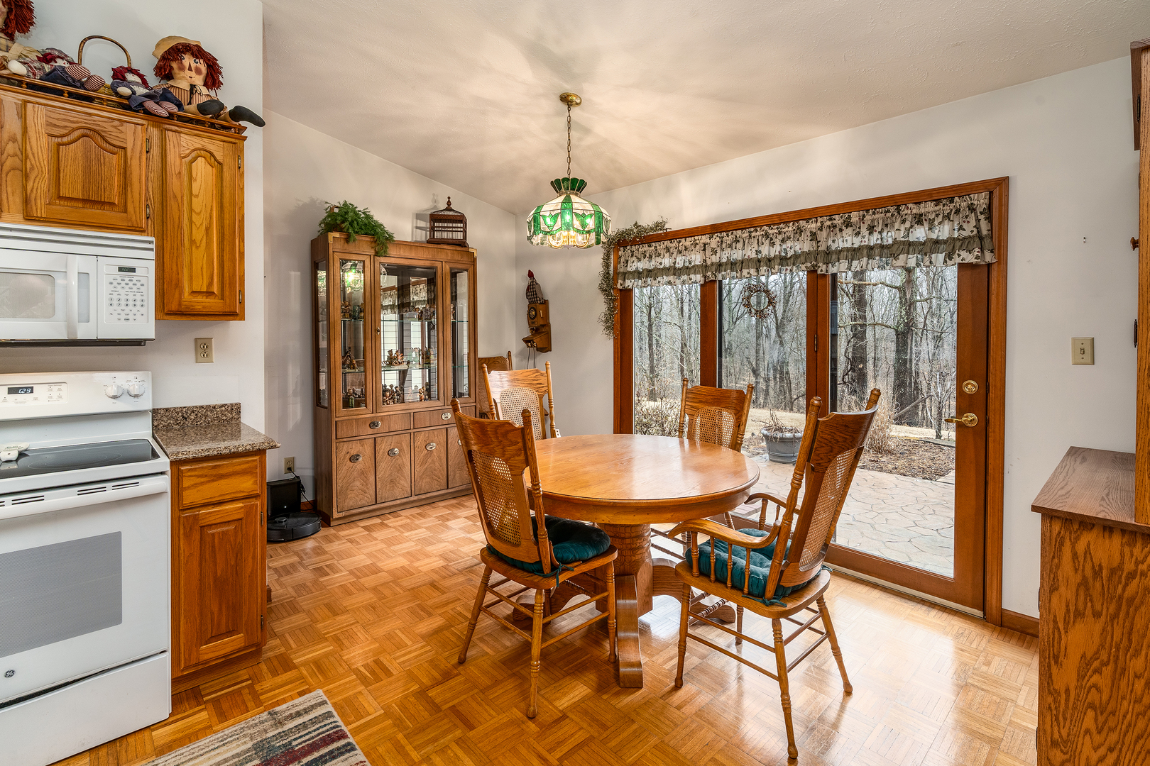 3085 Kaolin Road Cobden, IL 62920 - Photo 15 of 83 a view of a dining room with furniture window and wooden floor
