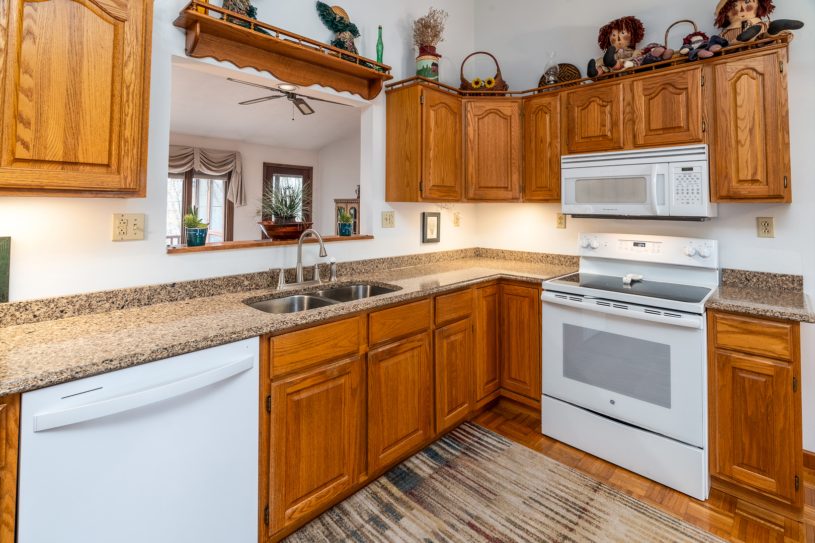 3085 Kaolin Road Cobden, IL 62920 - Photo 16 of 83 a kitchen with stainless steel appliances granite countertop a sink stove and cabinets