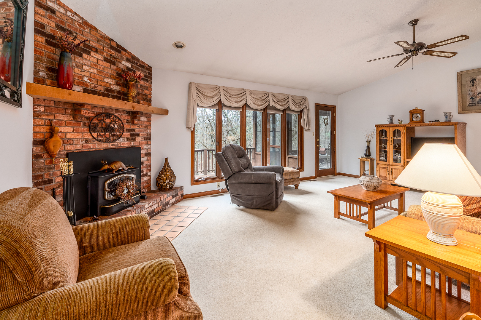 3085 Kaolin Road Cobden, IL 62920 - Photo 5 of 83 a living room with furniture a flat screen tv and a window