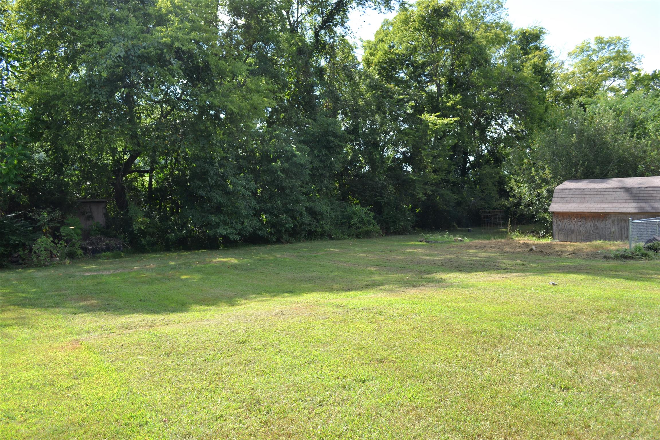 1184 Iron Bridge Road Columbia, TN 38401 - Photo 8 of 30 a view of a swimming pool with a yard