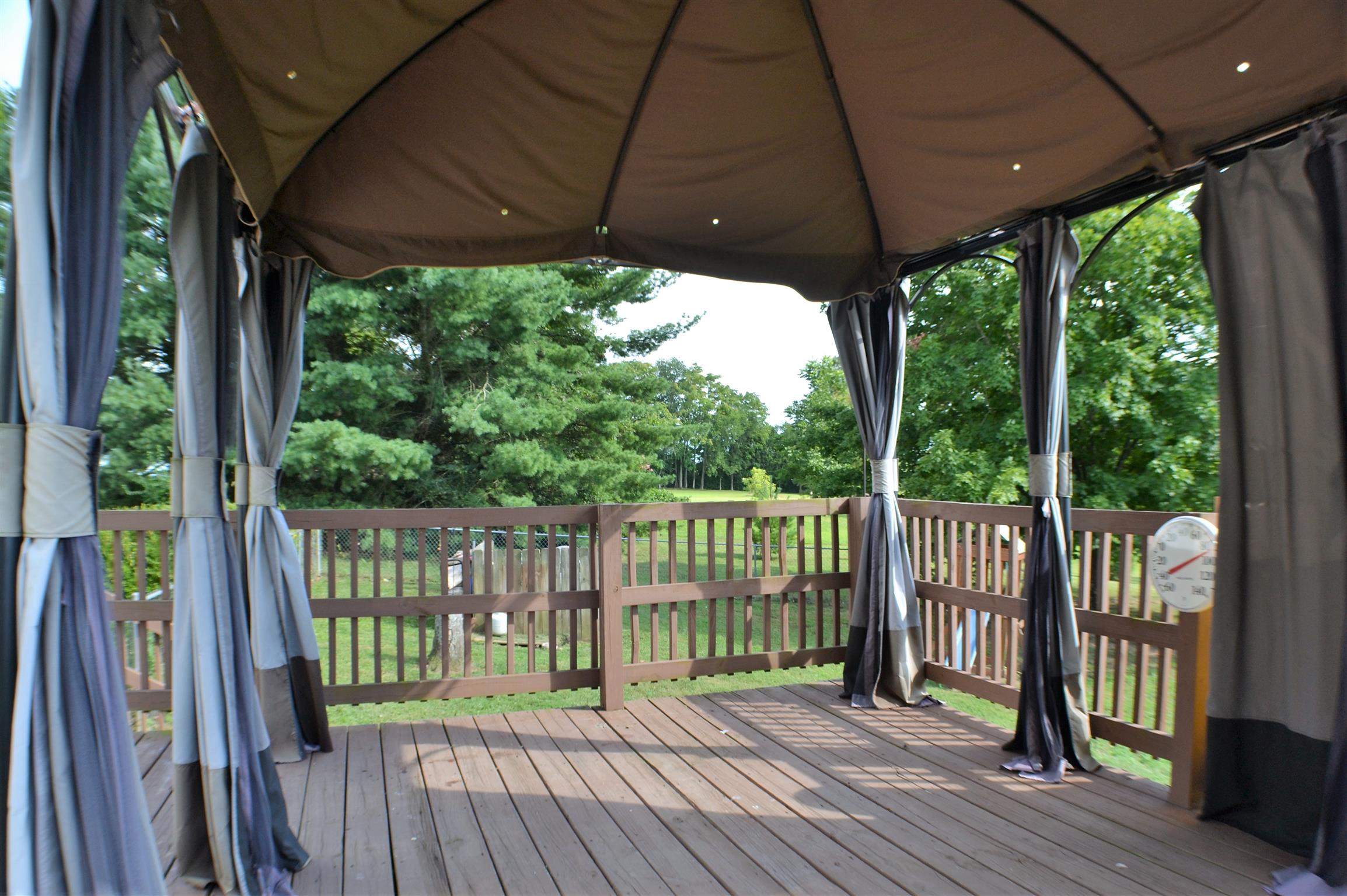 1184 Iron Bridge Road Columbia, TN 38401 - Photo 10 of 30 a view of a wooden deck next to a yard