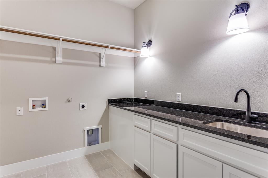 555 Aermotor Loop Weatherford, TX 76085 - Photo 21 of 30 a close view of sink and tap