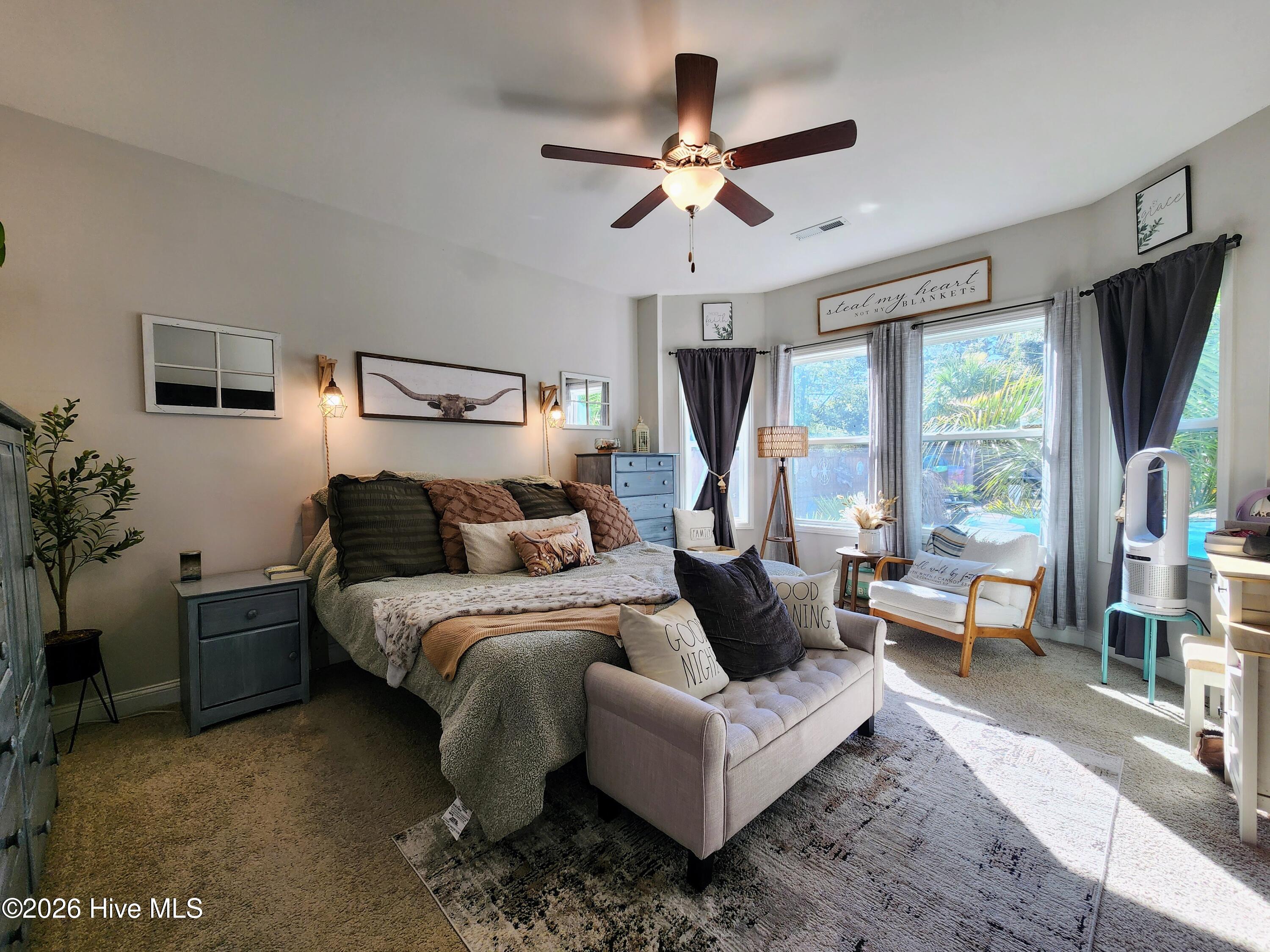 1133 Spincast Road Southport, NC 28461 - Photo 14 of 64 First Floor Primary Suite