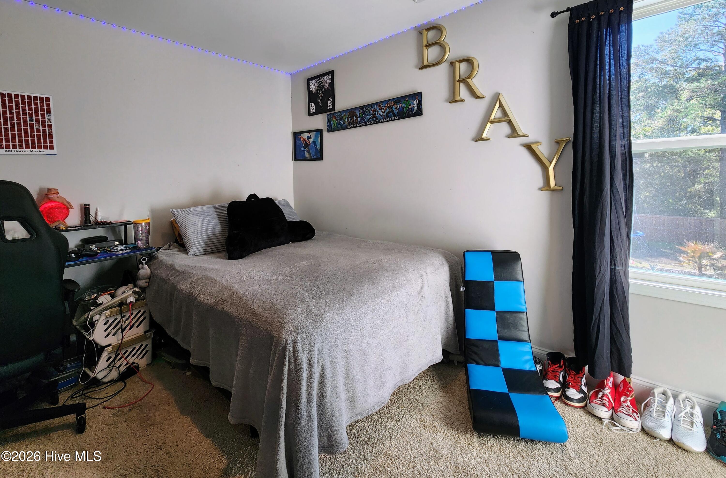 1133 Spincast Road Southport, NC 28461 - Photo 30 of 64 Bedroom 3 with Walk in Closet