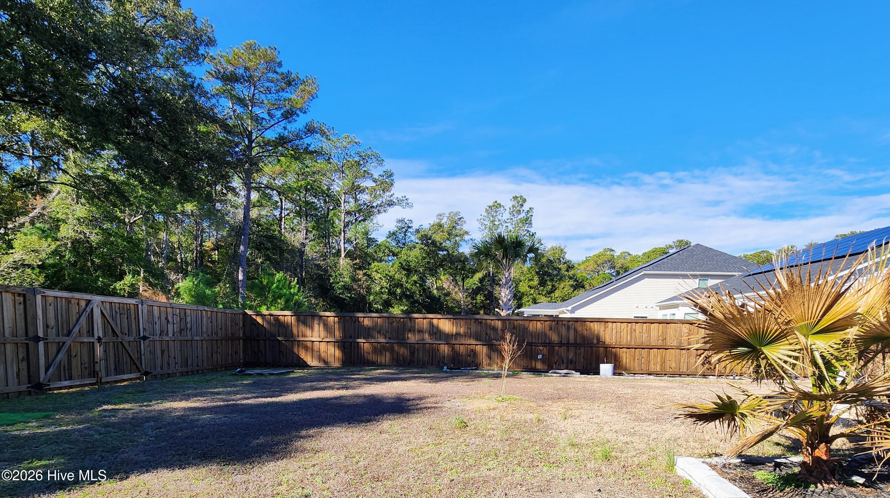 1133 Spincast Road Southport, NC 28461 - Photo 43 of 64 Fully Fenced Backyard