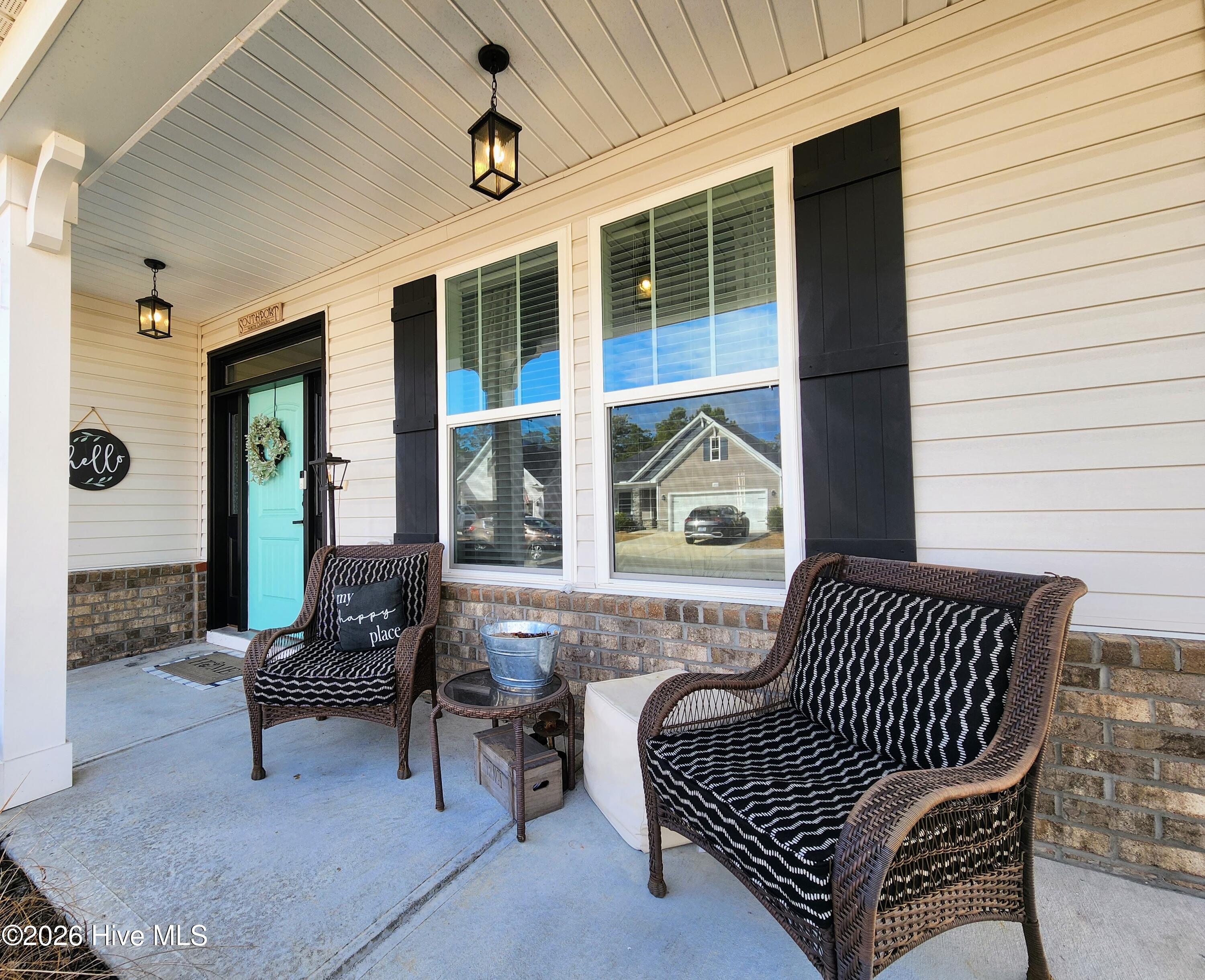 1133 Spincast Road Southport, NC 28461 - Photo 54 of 64 Covered Front Porch