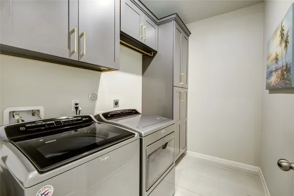 a kitchen with a stove and a microwave