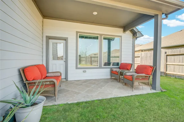 a building outdoor space with patio furniture