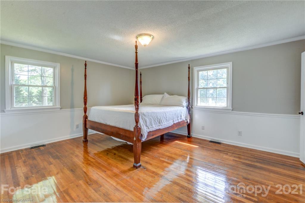 2407 Rufus Ratchford Road Gastonia, NC 28056 - Photo 22 of 42 a bedroom with a bed and a window