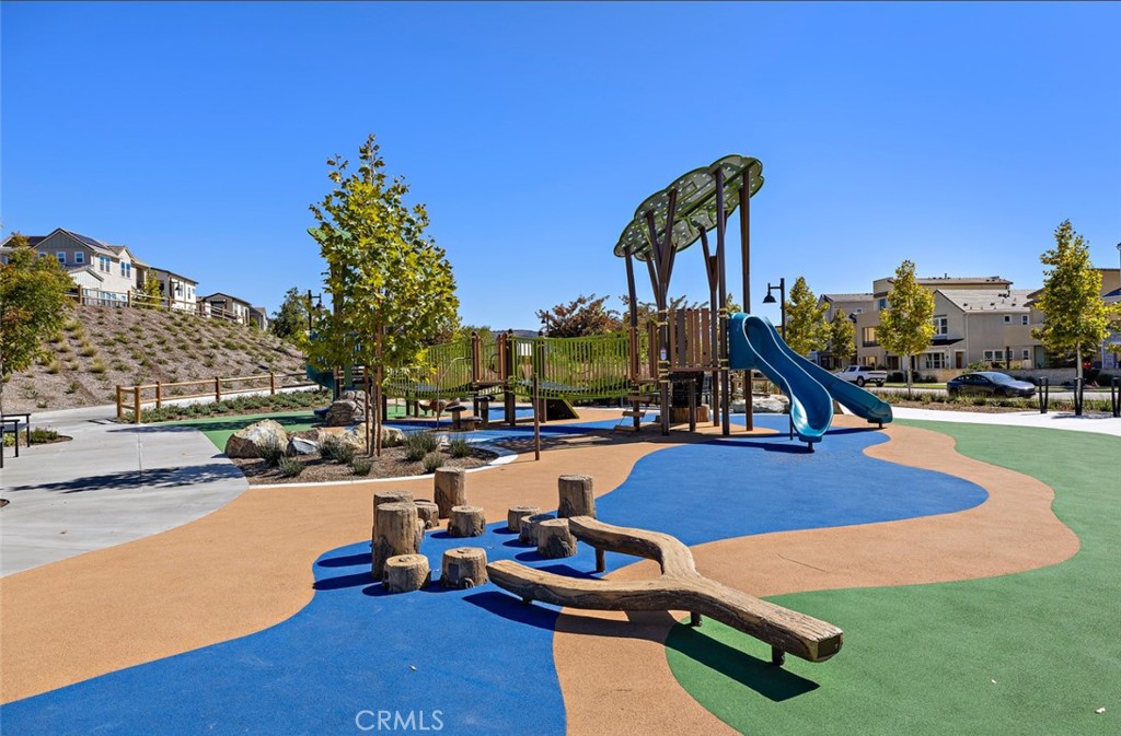 26 Paranza Place Rancho Mission Viejo, CA 92694 - Photo 62 of 65 a swimming pool with outdoor seating and yard