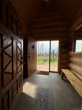 a view of an empty room with stairs