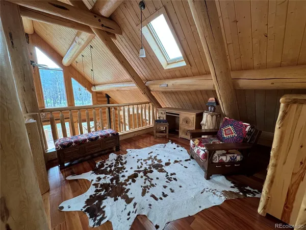 a view of entryway with wooden floor