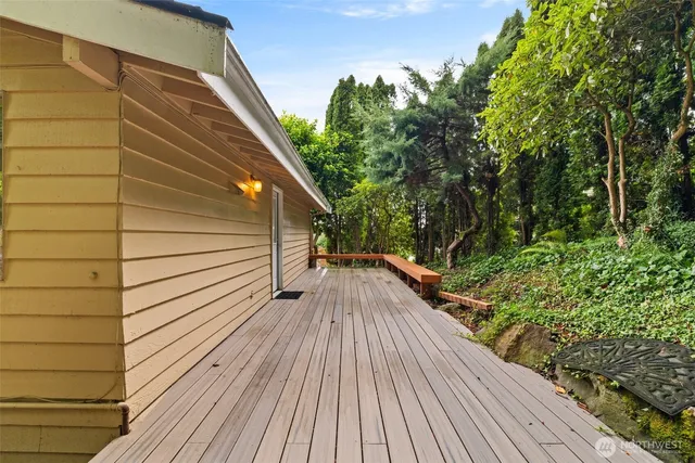 a view of balcony with wooden floor