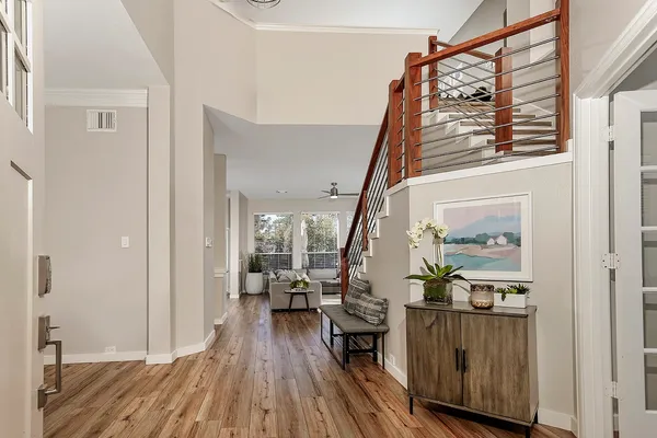 a view of entryway with wooden floor