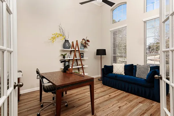 a view of a dining room with furniture window and wooden floor