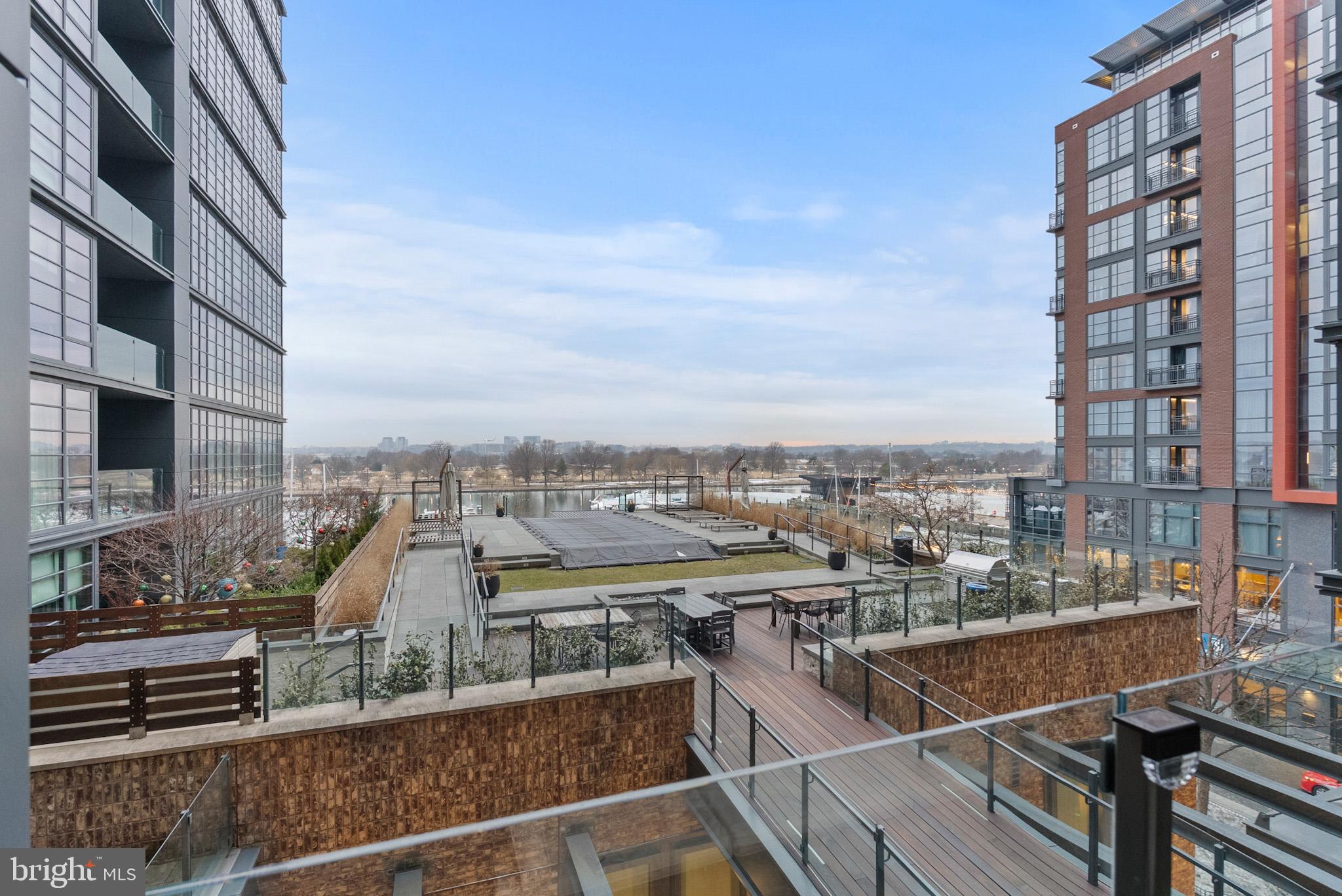 45 Sutton Square Southwest, Unit 403 Washington, DC 20024 - Photo 45 of 80 a view of a city with tall buildings