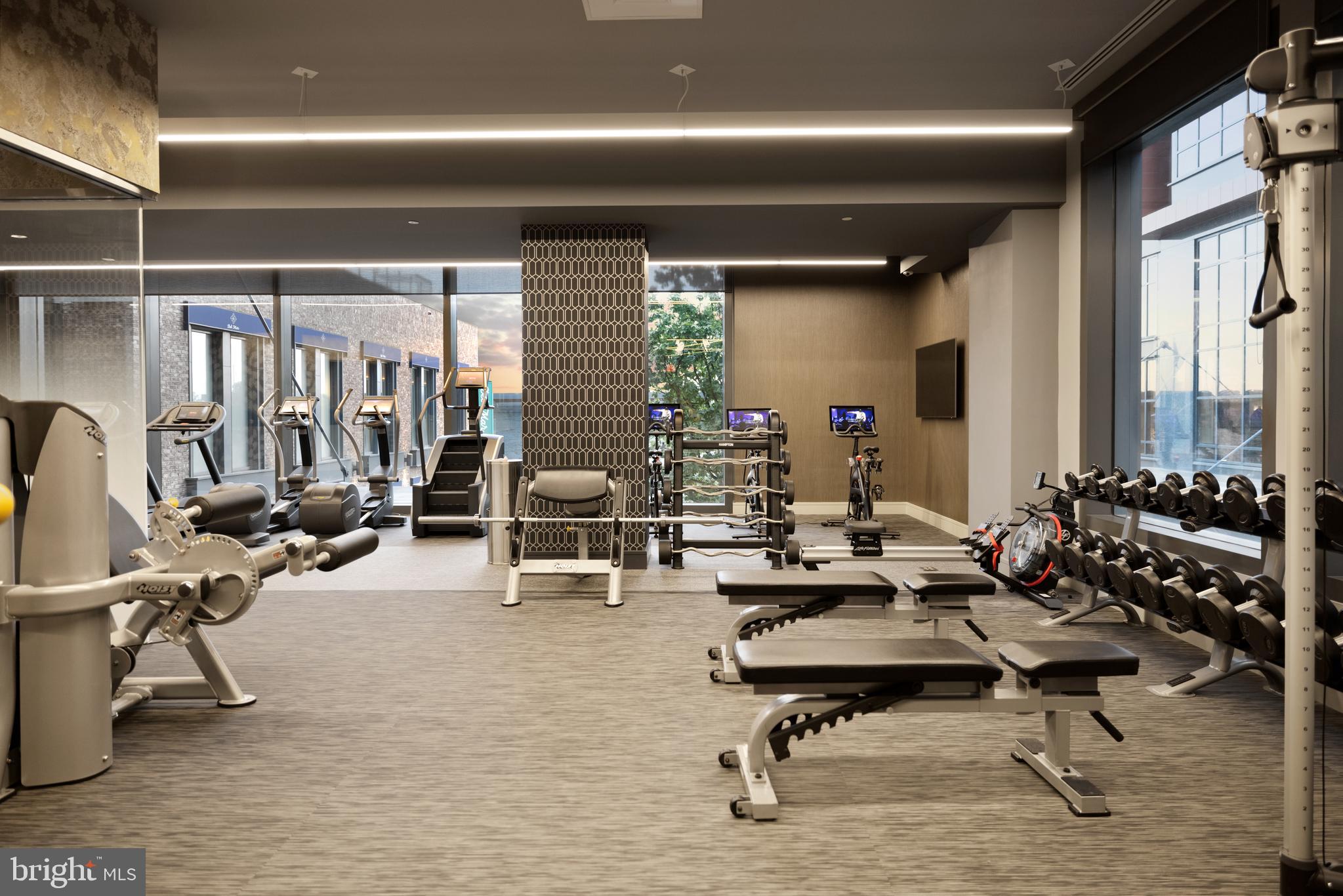 45 Sutton Square Southwest, Unit 403 Washington, DC 20024 - Photo 54 of 80 a view of a room with gym equipment