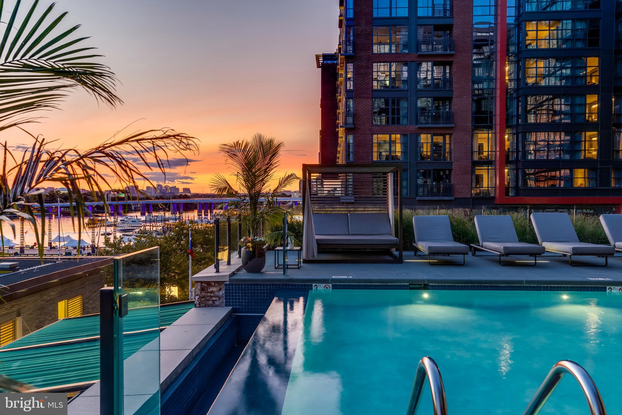 45 Sutton Square Southwest, Unit 403 Washington, DC 20024 - Photo 71 of 80 a view of swimming pool with outdoor seating