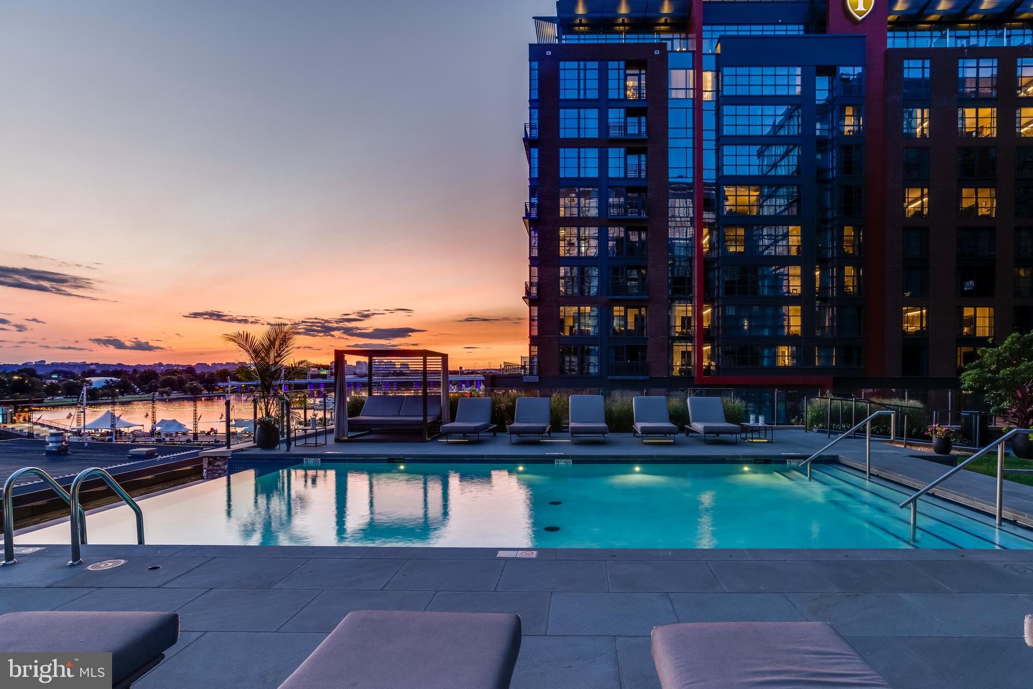 45 Sutton Square Southwest, Unit 403 Washington, DC 20024 - Photo 76 of 80 a view of swimming pool with outdoor seating